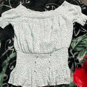 White with little blue flower design shirts